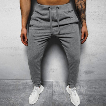 Men's Casual Solid Color Elastic Waist Loose Sports Pants 12510361M