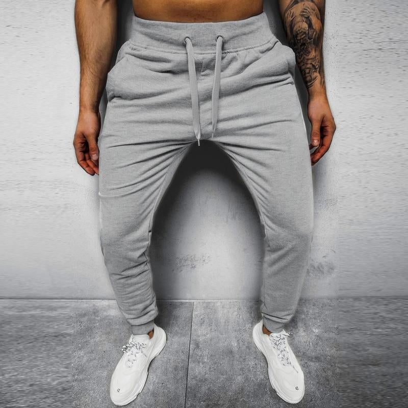 Men's Casual Solid Color Elastic Waist Loose Sports Pants 12510361M