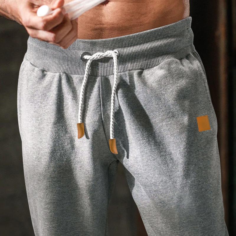 Men's Loose Drawstring Solid Color Sports Pants 88544830U